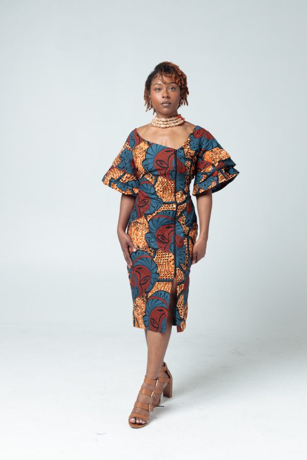 A Patterned Ankara Dress. Left side of the dress zips into the right side. Sleeves are layered 3 times to elbow length. Perfect for any occasion!