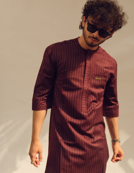 Elevate your style with our Striped Traditional African Kaftan with Trousers. A timeless blend of heritage and modernity for the contemporary man.