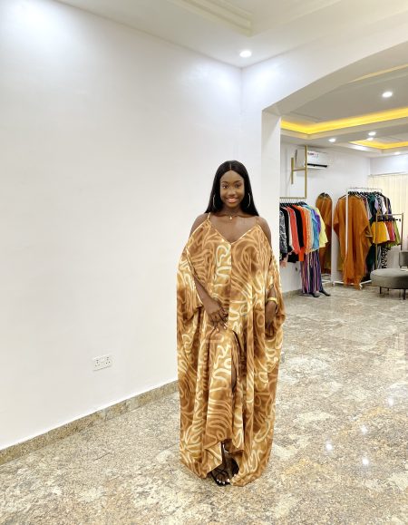 This stylish African dress for women is a blend of cultural elegance and chic fashion, perfect for a unique look.