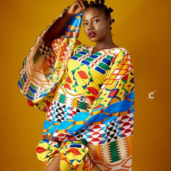 Distinctive Ankara Two-Piece Set - Long bell sleeve top with skirt, a blend of African fashion and timeless elegance.