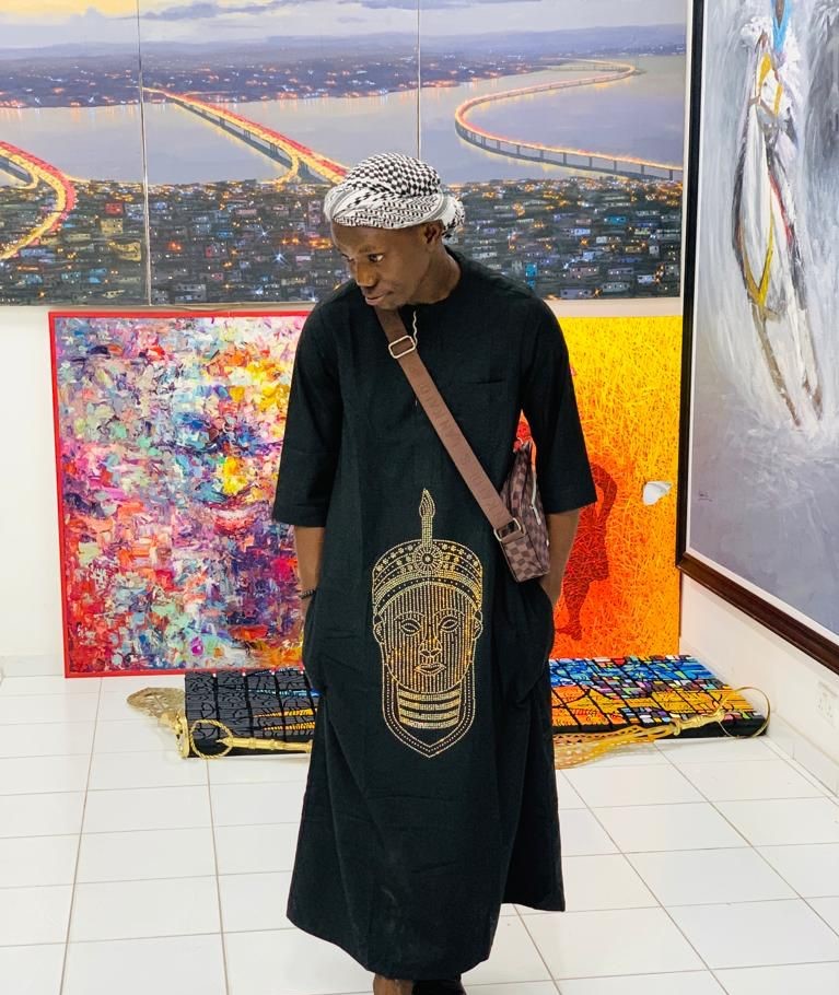 Unique Black Men's Kaftan with Oduduwa Image - A cultural fashion statement, combining tradition and style seamlessly.