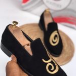 Luxurious black velvet shoes for men, adding a touch of elegance and sophistication to any folklore outfit.