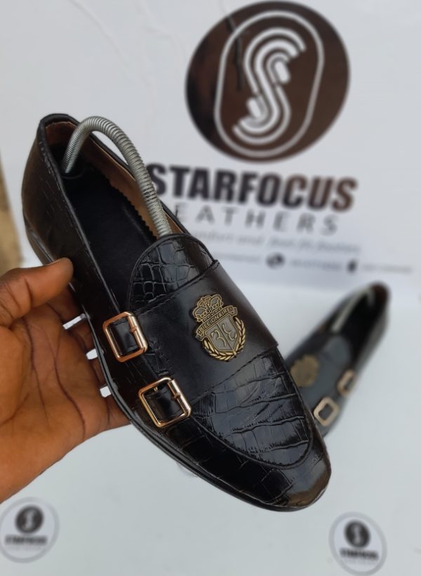 Step up your shoe game with our dapper black leather double monk strap loafers with billionaire logo. Available in sizes 40-46. Grab a pair today!