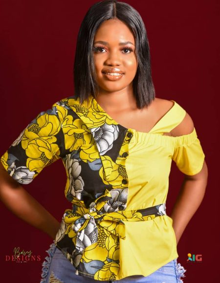 Stunning women's top with a unique half Ankara, half plain yellow design. Look absolutely gorgeous in yellow. Get yours now!