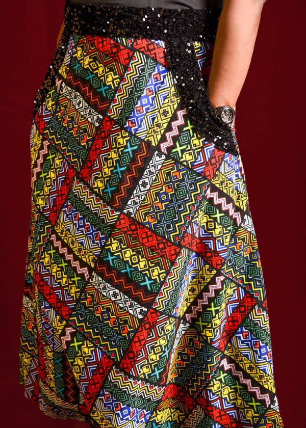 Stylish multicolored Ankara & sequin skirt with pockets. Available in sizes 12-16. Effortless style for any occasion. Shop now!
