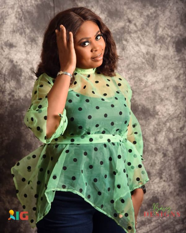 Refresh your style with our delightful Lemon Green and Black Organza polka dot top. Sizes 12 & 14 available. Shop now for a dash of elegance!