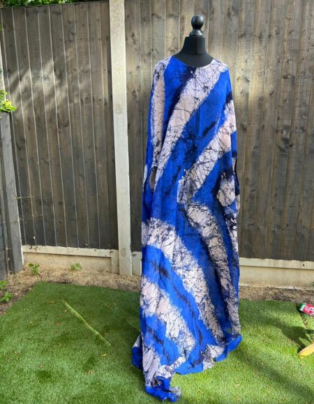 Discover elegance in our blue and grey African print cocoon-dress for women. Unique style, vibrant patterns, and unmatched comfort await you!