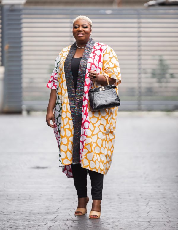 A multi- colored kimono, with detailed aso-oke at the neckline. Perfect for a casual event. Step out in style and command your respect as a boss!