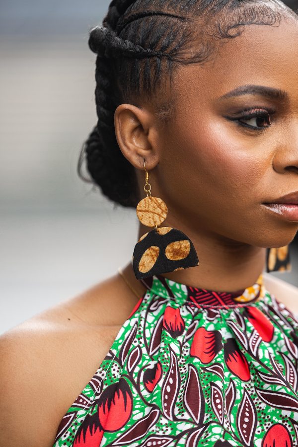 Elegant African-inspired designer earrings in stunning black and brown print. The perfect accessory to elevate your style.