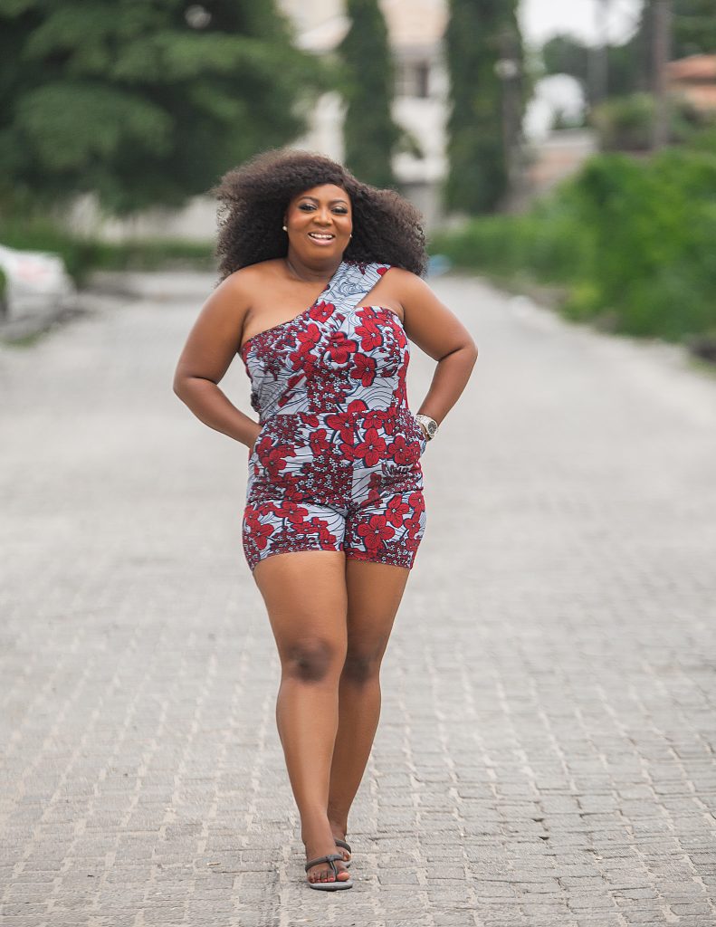 A Patterned Ankara Body Fitted Romper. Made with  pleated One-shouldered Sleeves. Embrace style and comfort in this unique fashion statement.