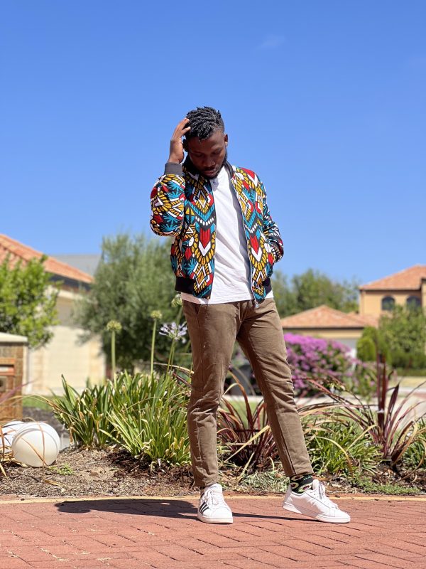 "Elevate your style with our Ankara bomber jacket – a fusion of culture and fashion. Discover unique designs that make a statement."
