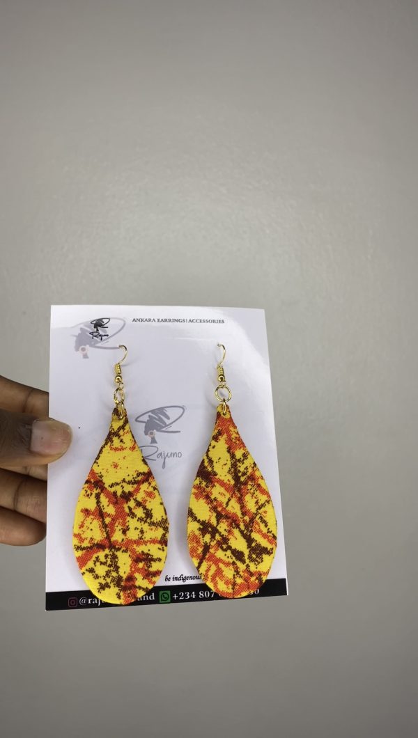 Discover unique Oval-shaped Ankara earrings, handcrafted with vibrant fabric patterns. Elevate your style with these culturally inspired accessories.