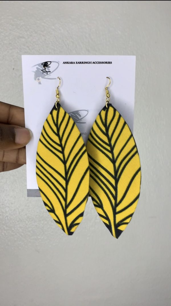 Discover unique Oval-shaped Ankara earrings, handcrafted with vibrant fabric patterns. Elevate your style with these culturally inspired accessories.
