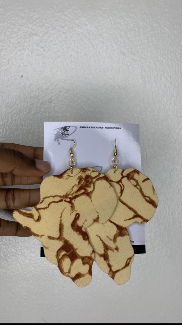 "Discover unique African map-shaped Ankara earrings, handcrafted with vibrant fabric patterns. Elevate your style with these culturally inspired accessories."