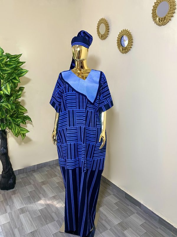 Discover elegance in simplicity with MERAH Bubu dress—a stunning fusion of Ankara and aso oke fabric. This one-size-fits-all dress is a perfect blend of style and comfort.