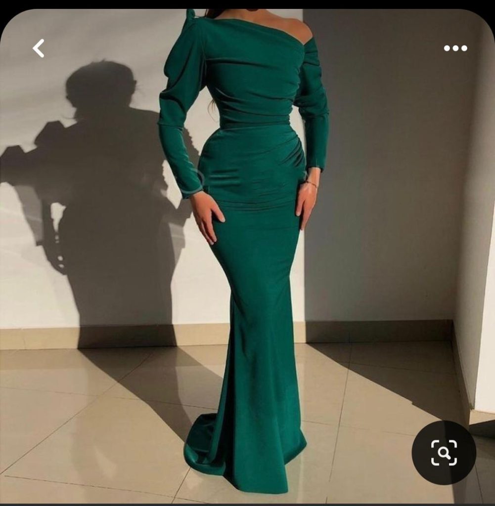 Step into sophistication with our Army Green Ball Room Dress. Crafted from luxurious details, this plain yet elegant garment offers a flattering silhouette and comfort for any formal occasion. Its timeless design ensures you stand out with understated elegance, making it perfect for galas, ballroom events, or any glamorous affair.